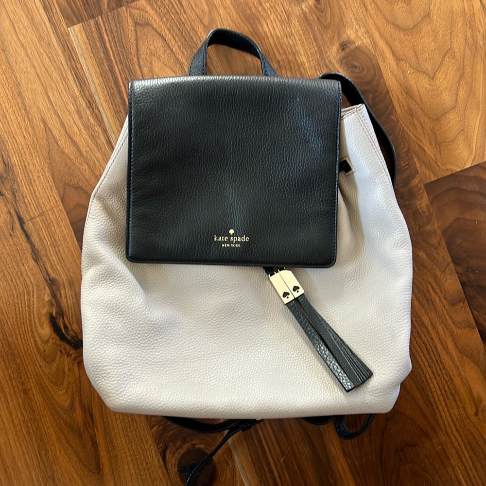 Kate spade tan and black backpack. Excellent condition